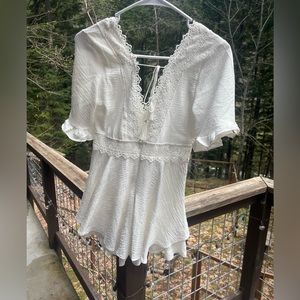 White flowy backless romper